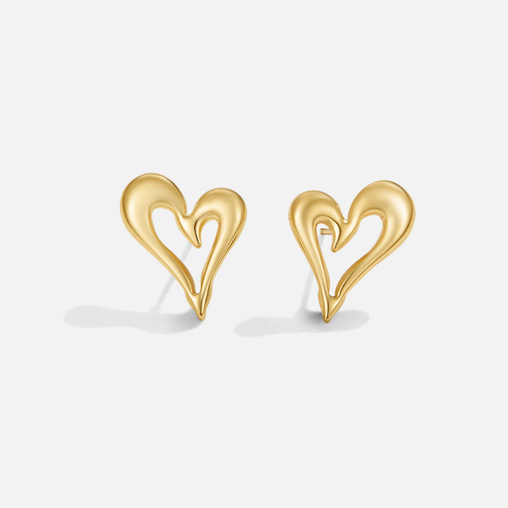 Celine gold heart stud earrings