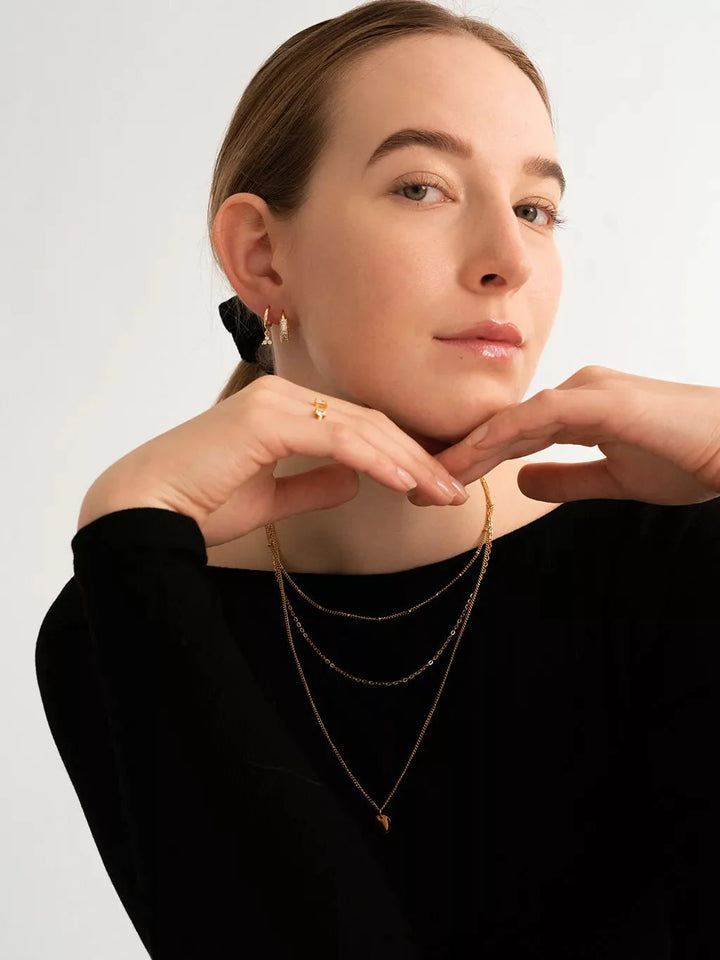 Rhythm Ohrringe Gold