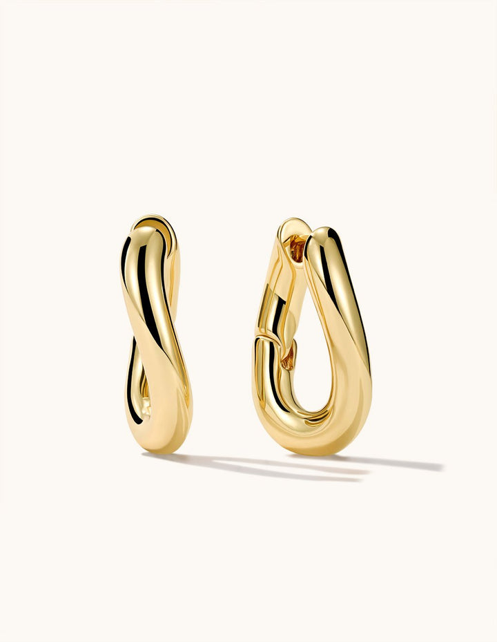 Wavy Huggie Hoop Ohrringe Gold Silber